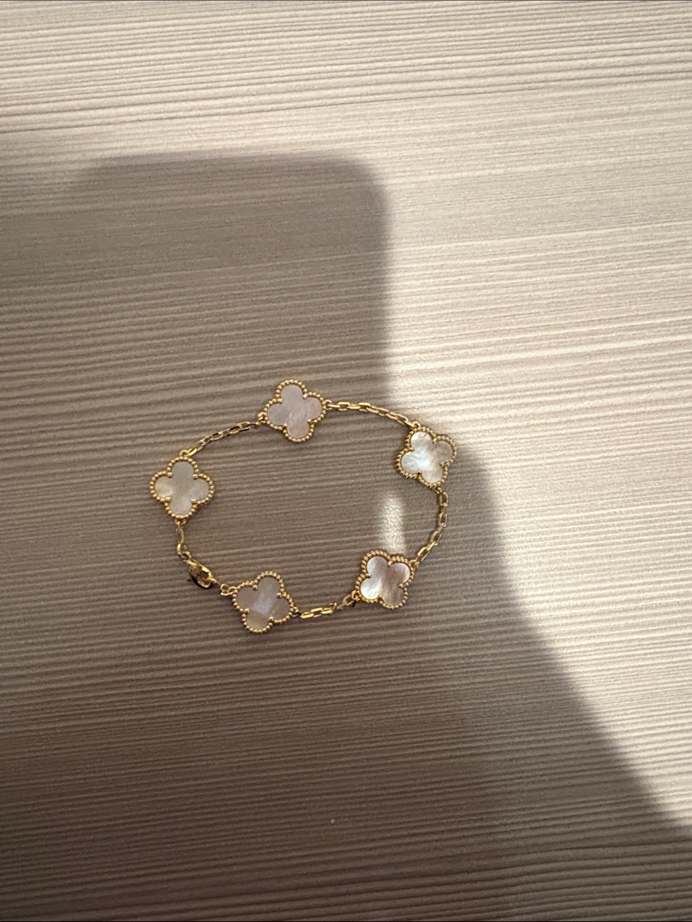Gold-Tone Clover Link Bracelet with White Mother-of-Pearl Accents